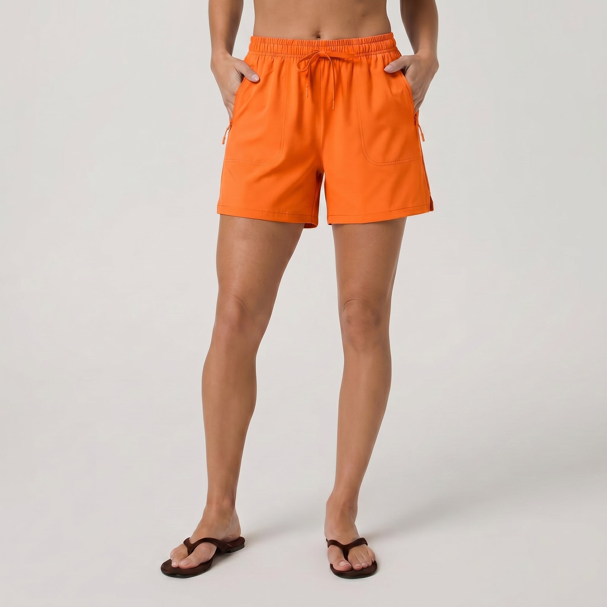 Orange MAGCOMSEN Women's 5 Inch Water Resistant Hiking Shorts UPF 50 Plus Quick Dry Golf Shorts with Zipper Pockets in #Color_Orange